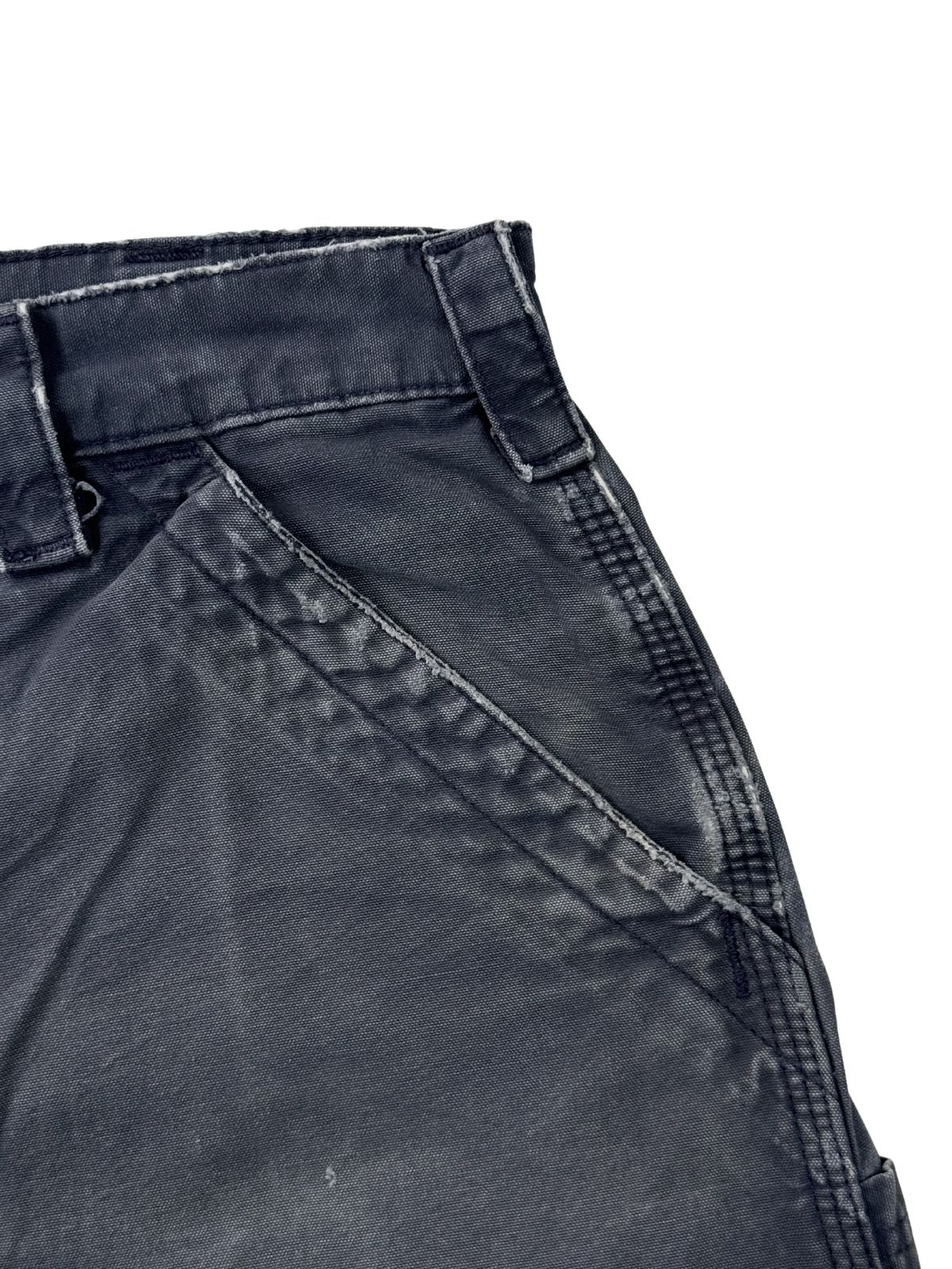 Detail der linken Eingriffstasche einer Vintage Workwear Shorts aus strapazierfähigem Baumwoll-Canvas in Navy.