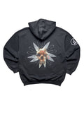 Rückseite des schwarzen Disbelief Vintage-Hoodies von 2005 in der Gesamtansicht mit großem kreisförmigen Backprint aus Messer-Klingen und Schädel-Motiv.