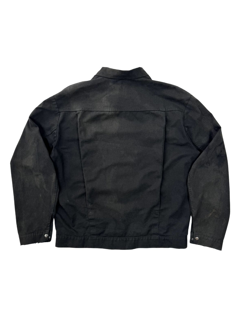 Rückansicht der Canvas-Jacke; zeigt die großen Bewegungsfalten (Action Back) und das authentische Sun-Fading im Schulterbereich.