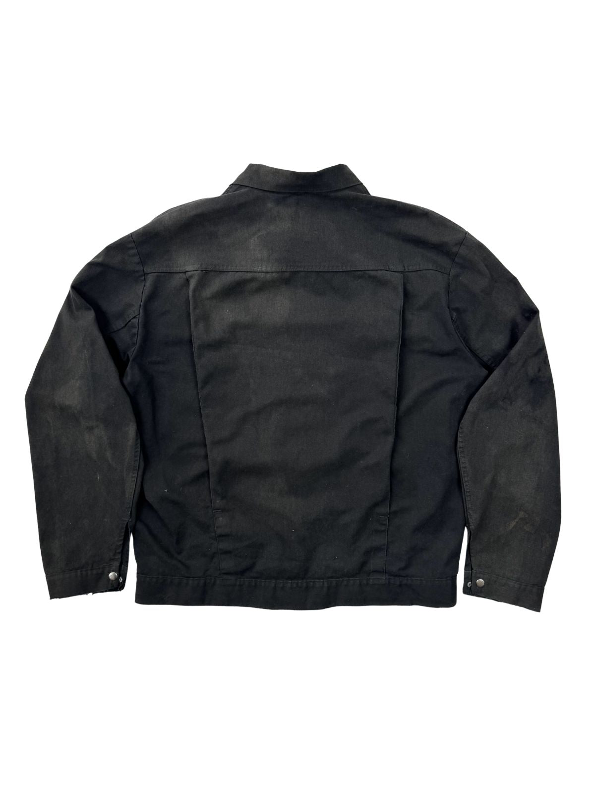 Rückansicht der Canvas-Jacke; zeigt die großen Bewegungsfalten (Action Back) und das authentische Sun-Fading im Schulterbereich.