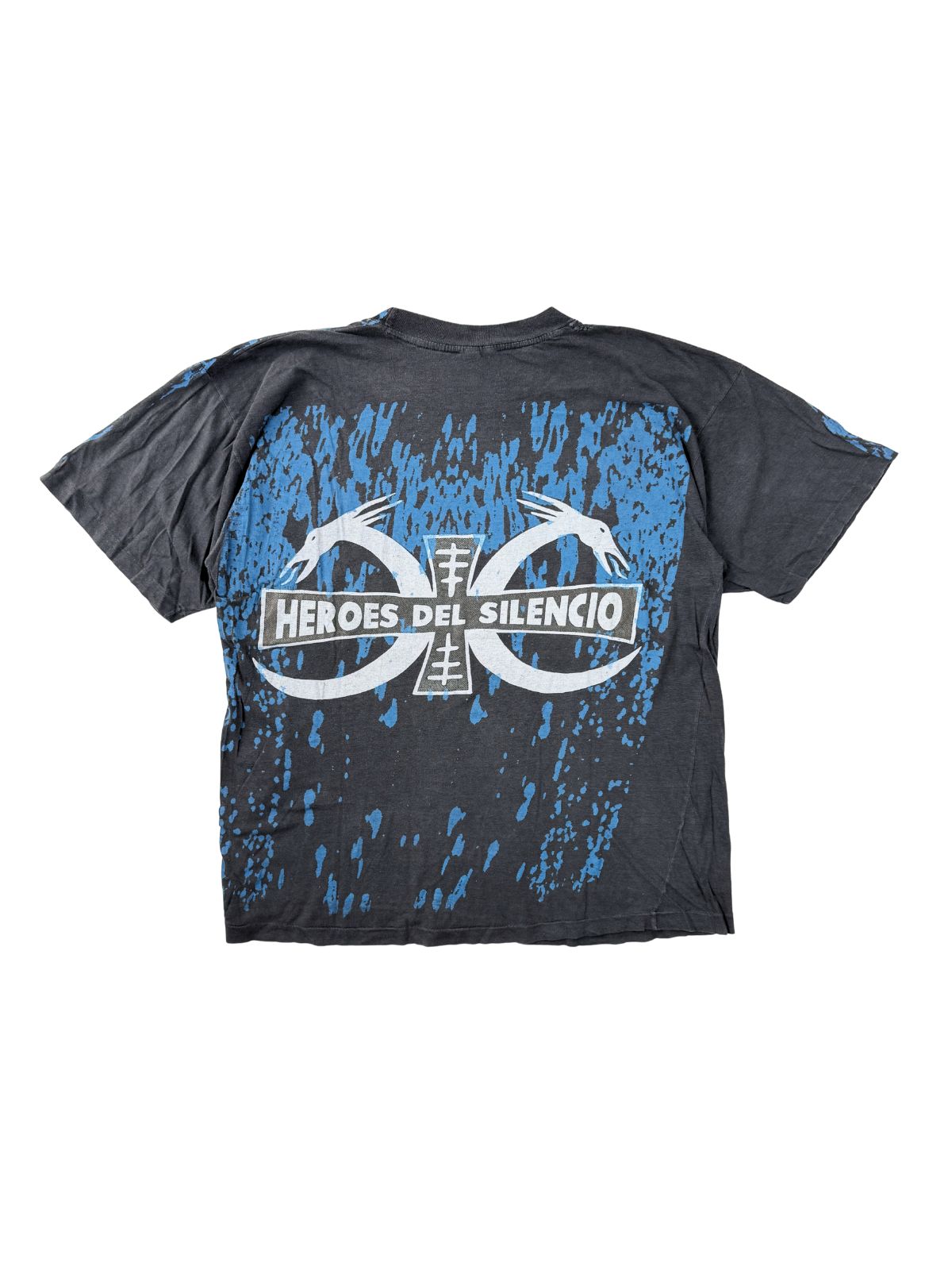 Rückansicht des Héroes del Silencio Shirts; zeigt das Band-Logo mit zwei Drachenköpfen vor einem großflächigen, blauen Spritzer-Muster auf schwarzem Grund.