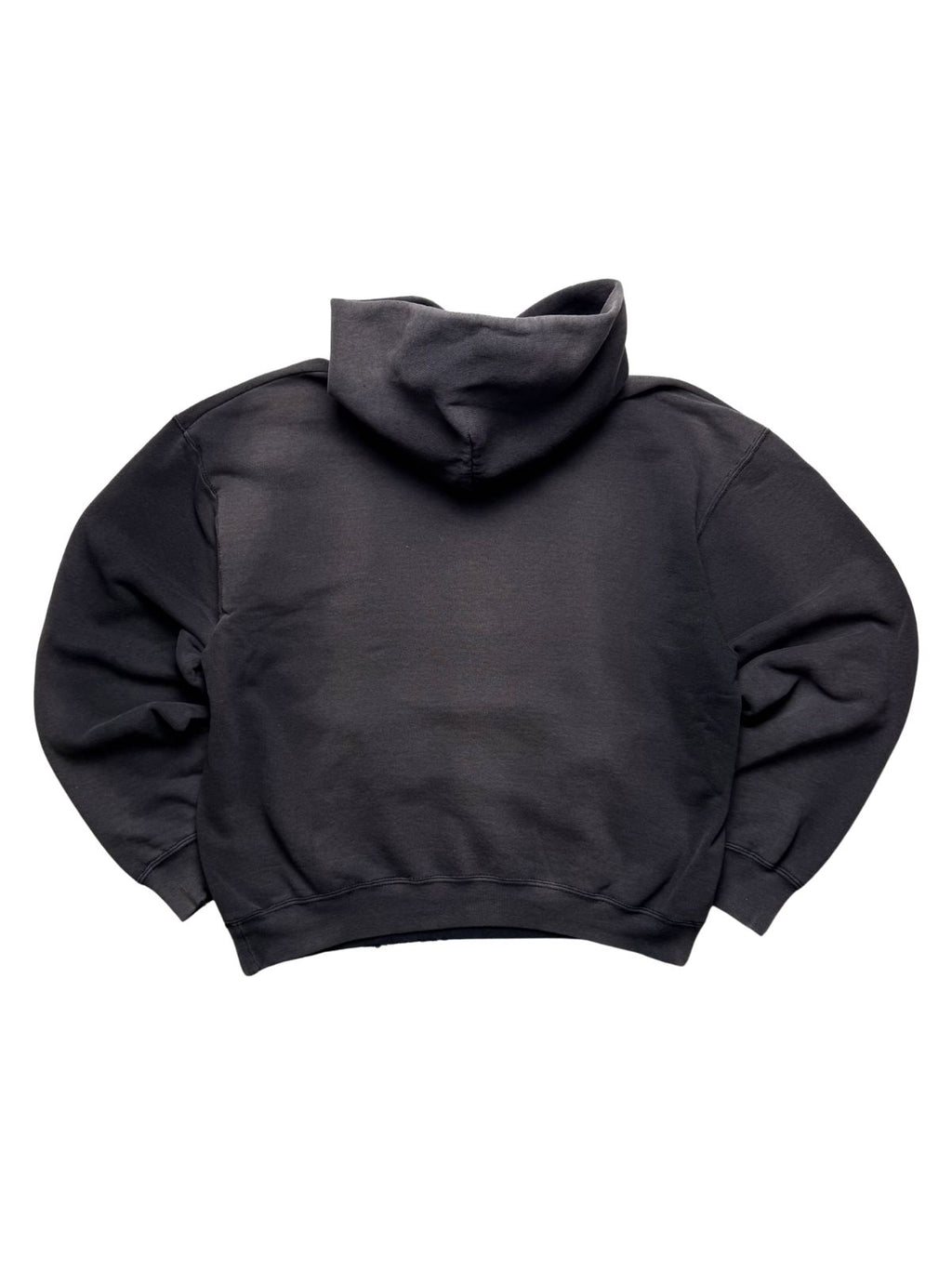 Rückseite des ausgewaschenen Nine Inch Nails Vintage-Hoodies in der unbedruckten Gesamtansicht mit entspanntem Boxy-Schnitt und natürlicher Ausbleichung.
