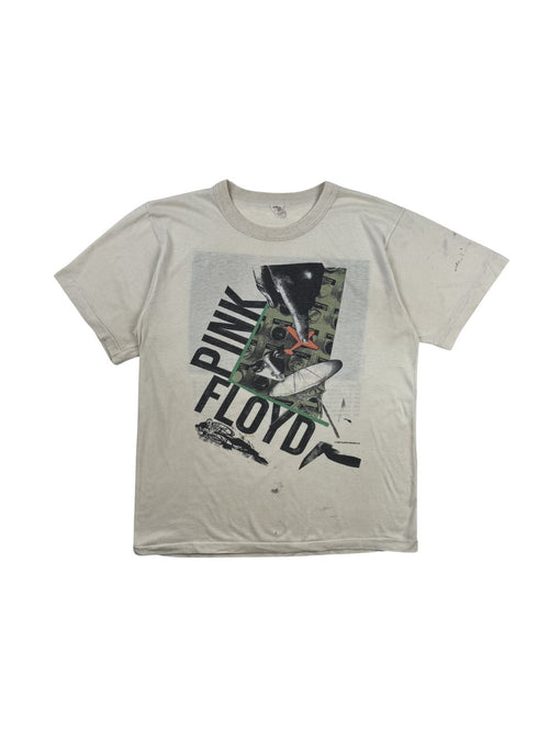 Originales Vintage Pink Floyd T-Shirt von 1987 zur „A Momentary Lapse of Reason“ World Tour. Weißes Progressive-Rock-Bandshirt in der Frontansicht mit surrealistischem Grafik-Print und diagonalem Band-Schriftzug.