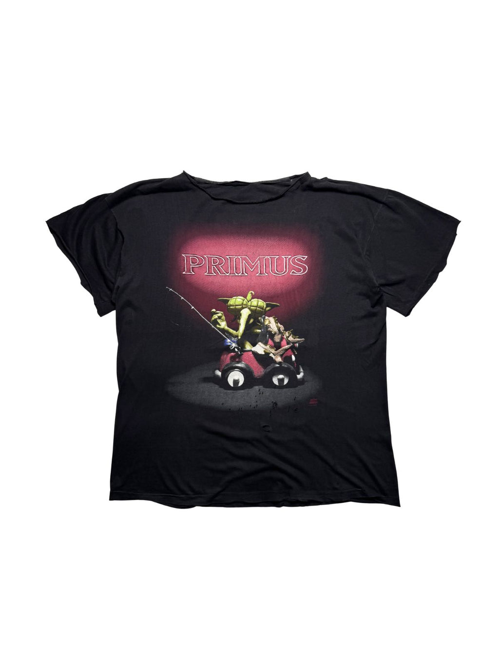Ausgewaschenes schwarzes Vintage Primus T-Shirt von 1993 zur EP „Miscellaneous Debris“ in der Gesamtansicht mit abgeschnittenen Ärmeln und ungesäumtem Kragen.