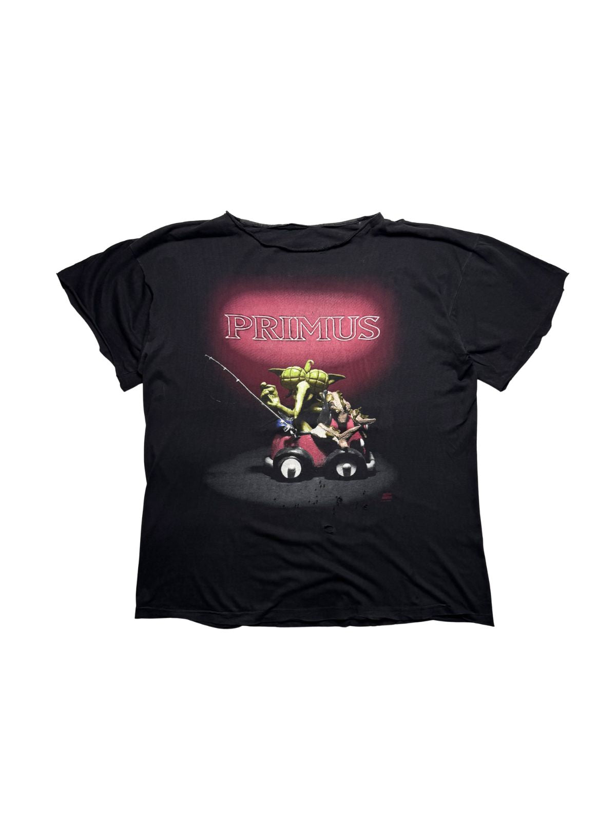 Ausgewaschenes schwarzes Vintage Primus T-Shirt von 1993 zur EP „Miscellaneous Debris“ in der Gesamtansicht mit abgeschnittenen Ärmeln und ungesäumtem Kragen.