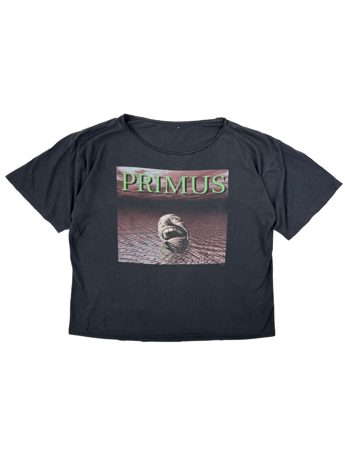 Vintage Primus T-Shirt zum Album „Tales from the Punchbowl“ von 1995. Oversize-Schnitt in Schwarz mit dem ikonischen Album-Cover-Print auf der Vorderseite.