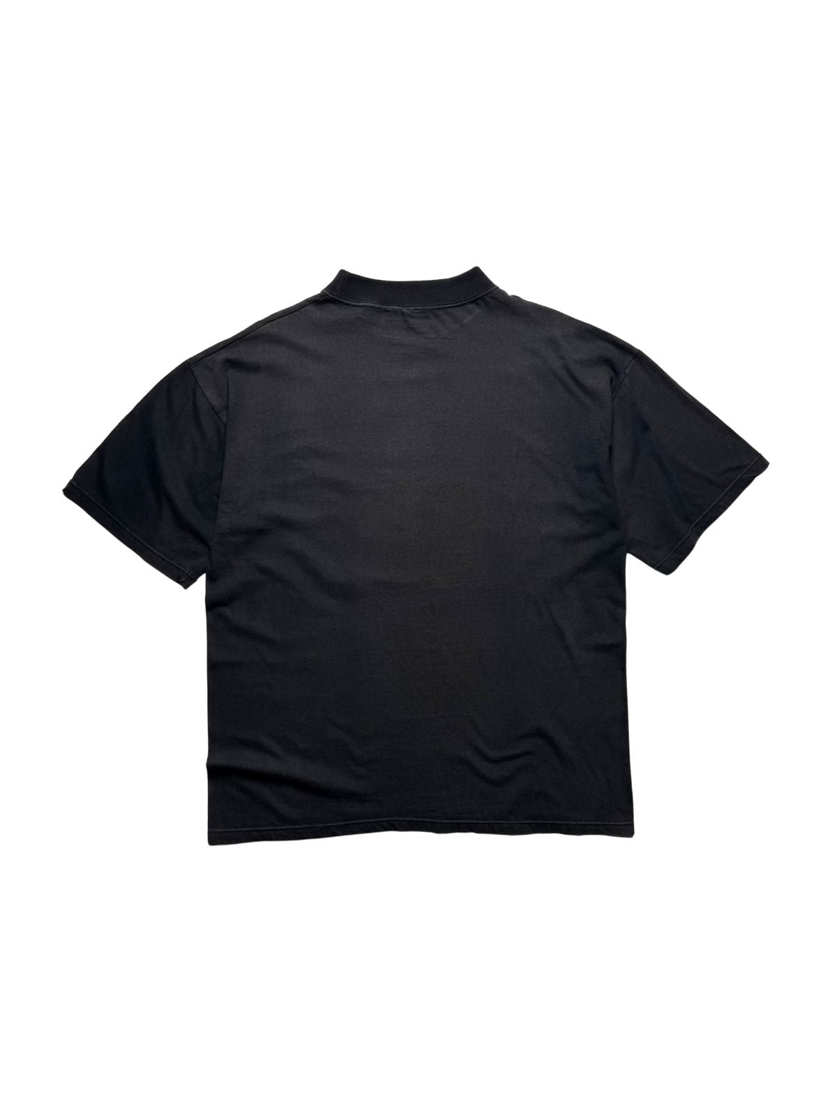 Rückseite des schwarzen Salvador Dalí Vintage-Shirts von 1996 in der unbedruckten Gesamtansicht auf dichter Baumwolle.